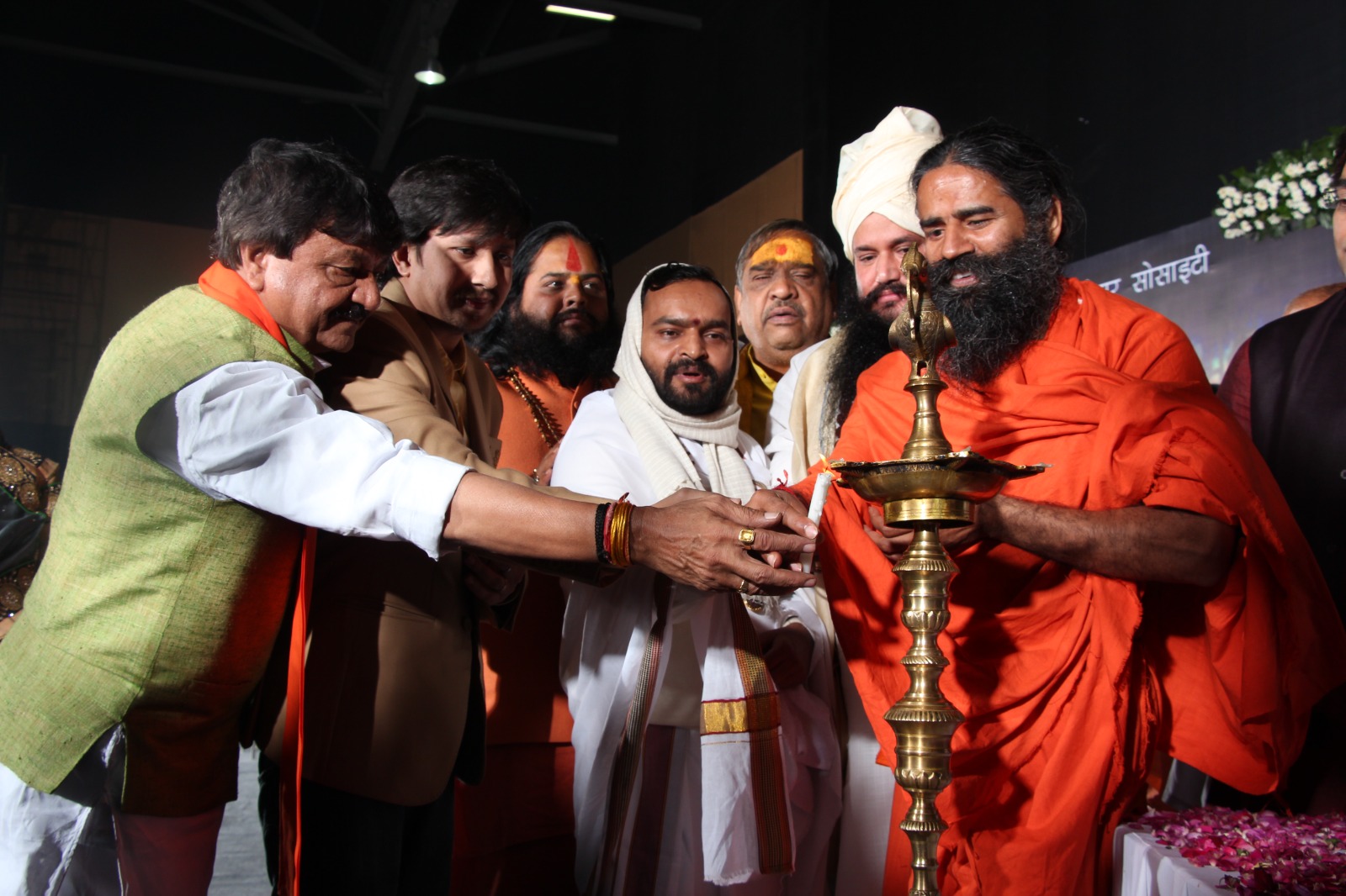 Lamp lighting ceremony with Baba Ramdev at the book launch